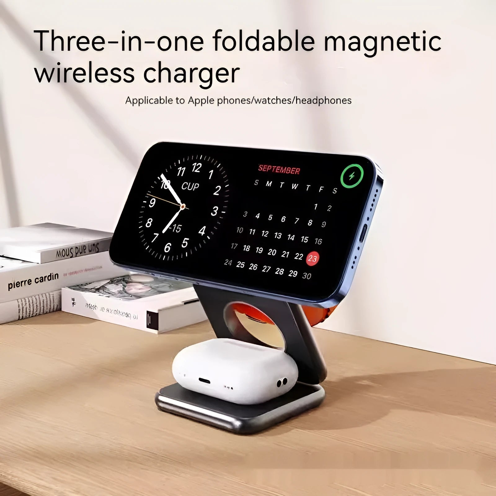 Foldable magnetic wireless charging phone holder in black on a desk
