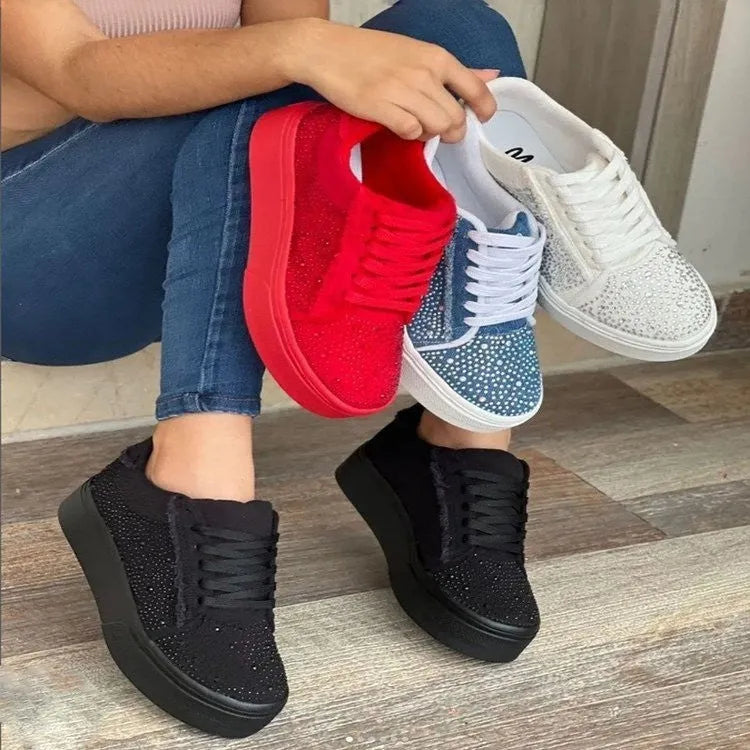 Plus size women's low-top lace-up casual shoes with rhinestone detail and a thick rubber sole, in black.