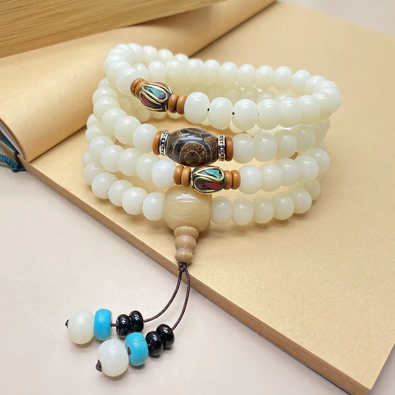 White Jade Bodhi beaded bracelet with 108 beads, shown in three different size and style variations.