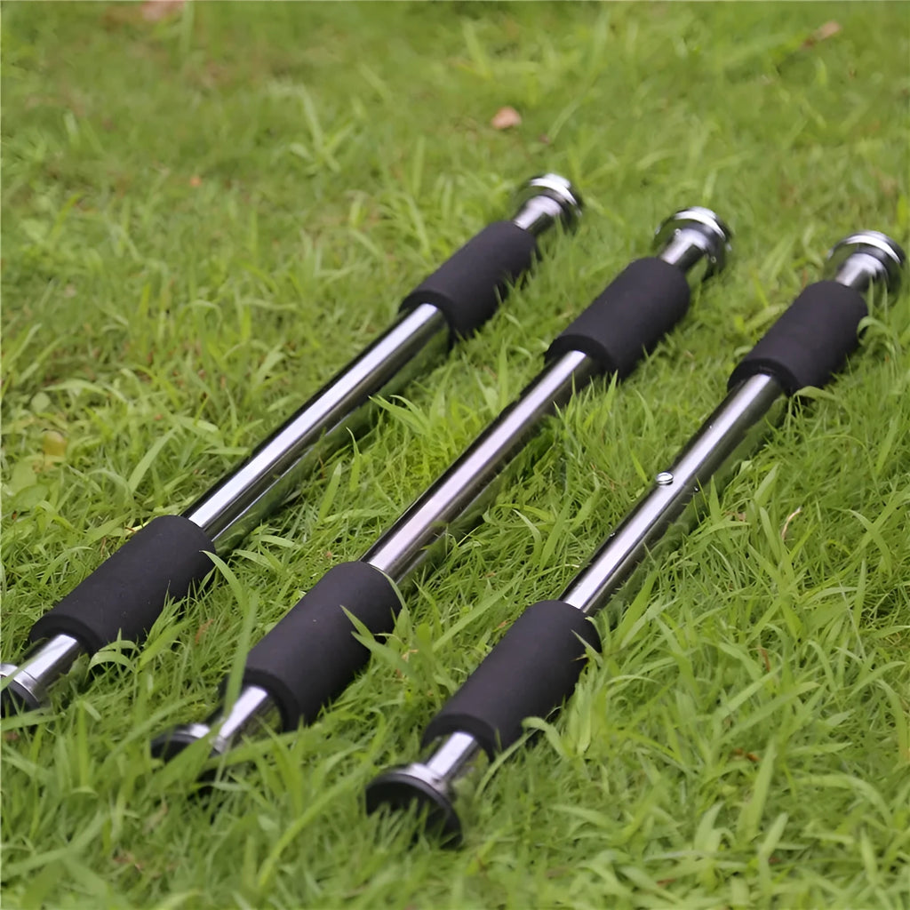 Steel adjustable pull-up bar extended between door frames for home fitness training