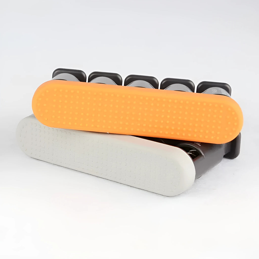 Grey and orange non-slip silicone climbing fingerboard finger trainer for musicians.
