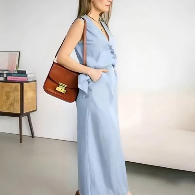 Women's casual two-piece suit with a sleeveless top and long skirt in a blue colour.