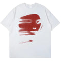 White loose-fit short-sleeve cotton t-shirt on a hanger, showing round neck and straight hem.