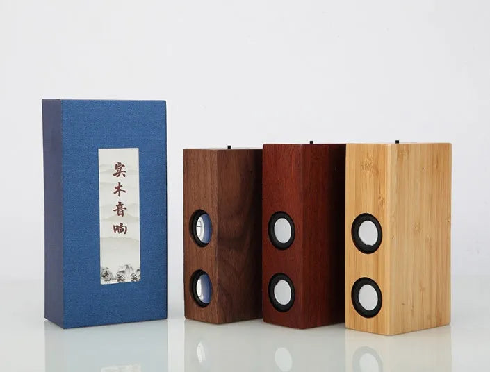 Retro wooden Bluetooth speaker showing natural wood grain in choice of bamboo, black walnut, or sapele finishes