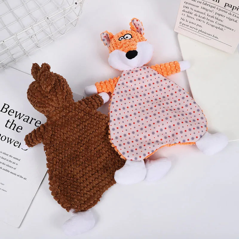 Brown, grey, and orange velvet pet stuffed toys in fox and elephant designs with crinkle sound paper inside.