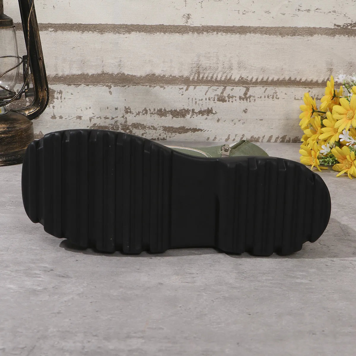 Women's black retro Martin boots with chunky heel, platform sole, and side zip.