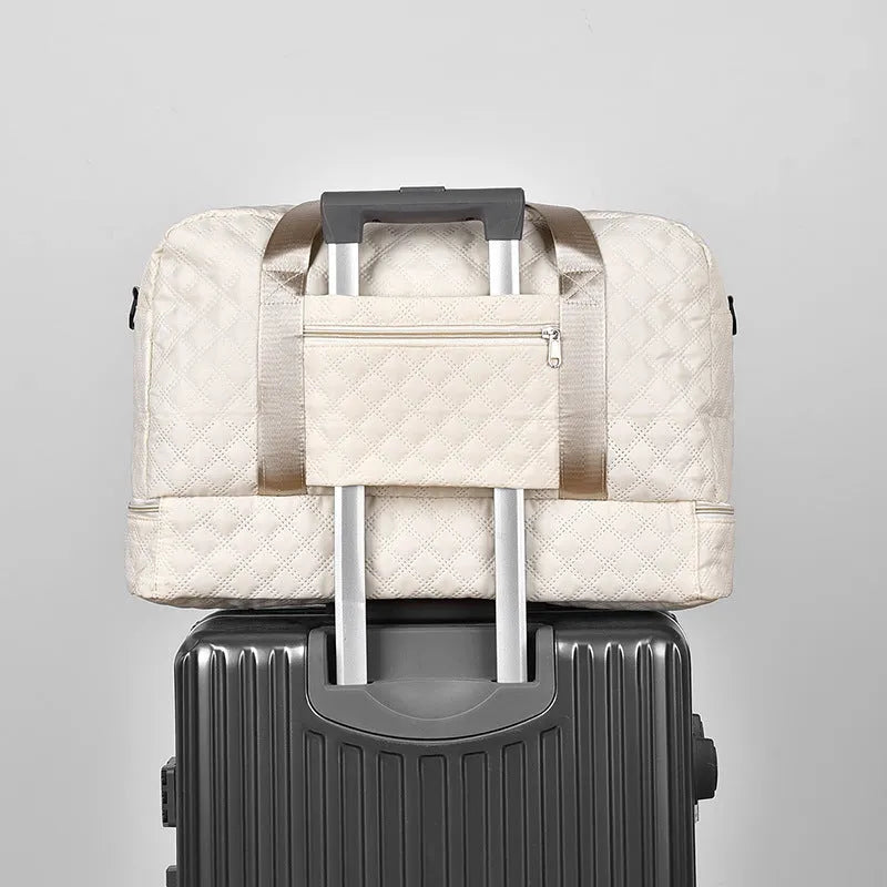 Portable buggy travel bag in Oxford cloth with 36-55L capacity shown in solid colour option