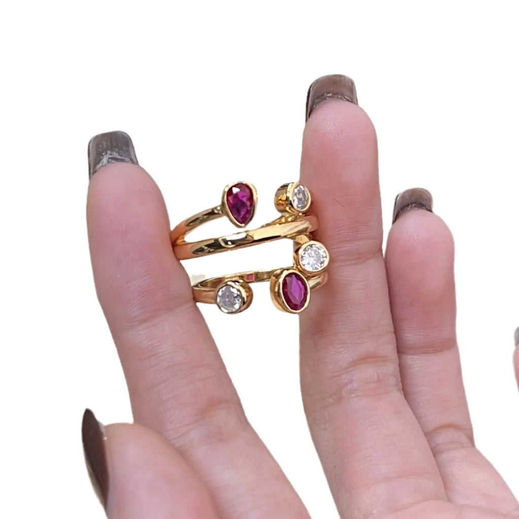 Geometric copper ring with irregular cross design and diamond accents in two-tone colours