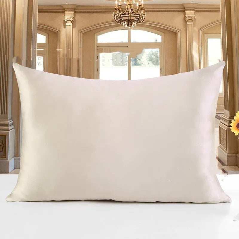 19 M double-sided silk pillowcase in apricot colour, showing envelope closure and smooth fabric texture.