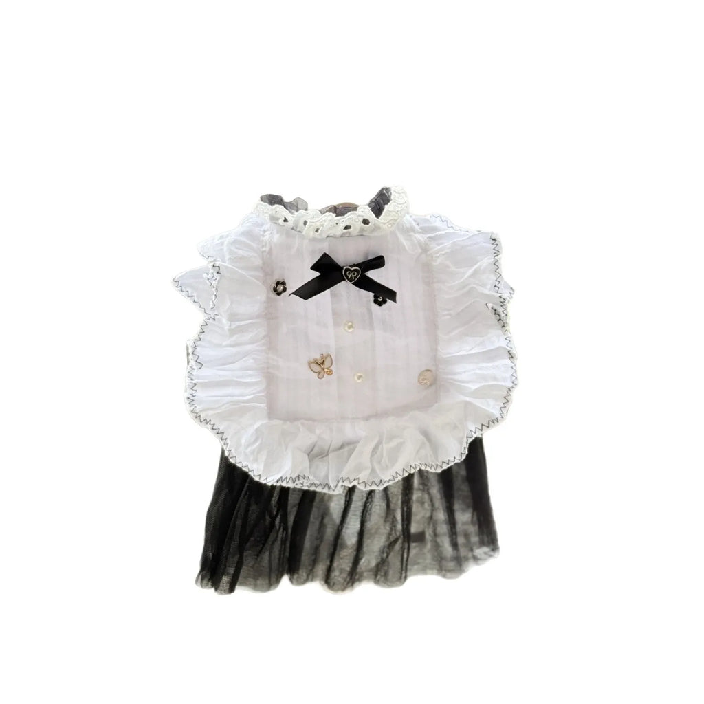 White polyester princess-style waltz gauze skirt for a small dog on a hanger.