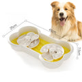 Large green slow feeder dog bowl with wave pattern and grooves, featuring anti-slip suction cups on base.