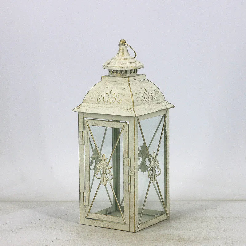 European wrought iron floor lantern with tempered glass in black gold or white gold finish, shown in small, medium, and large sizes.