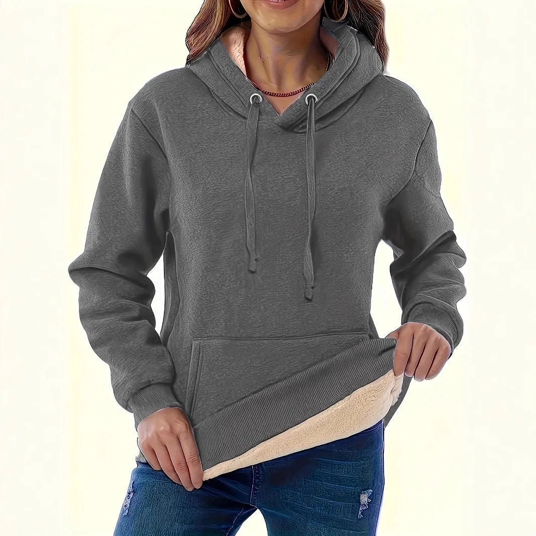 Women's loose fit hooded sweater in thick grey polyester fleece with a 3D pattern and front pockets.