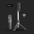 Black Bluetooth selfie stick tripod extended with smartphone mounted, wireless remote control shown