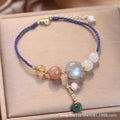 Hand-woven women's bracelet with peace buckle, crystal and sequin accents in red, green and blue colour options