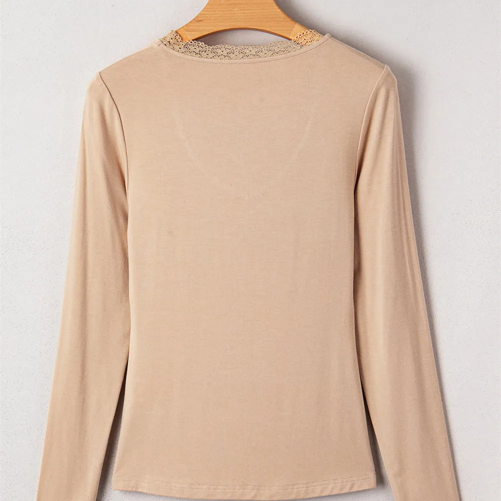 Red women's casual top with lace trim detail and long sleeves in slim fit design