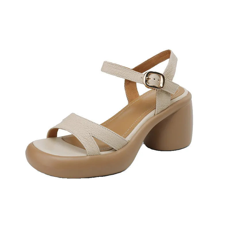 Women's open toe platform sandals in milky white colour showing round toe design and rubber sole
