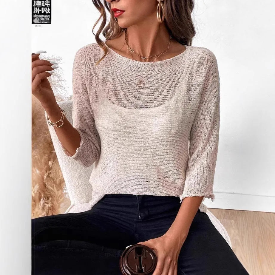 Women's thin knitted off-shoulder pullover overall in beige with 3/4 sleeves and a 3D pattern.