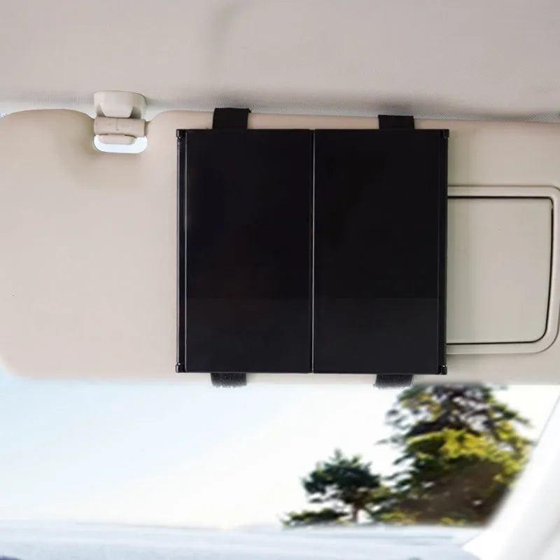 Silver car folding makeup mirror shown both closed and open positions