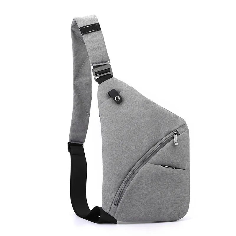 Men's oxford cloth chest bag worn on one shoulder in grey with letter detailing