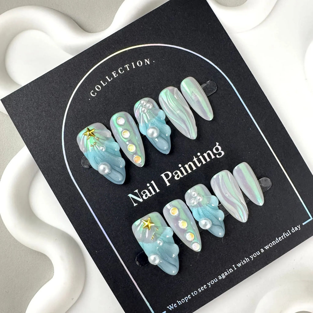 HAILANG blue shell pattern plastic artificial nail tips set showing sizes XS, S, M, L