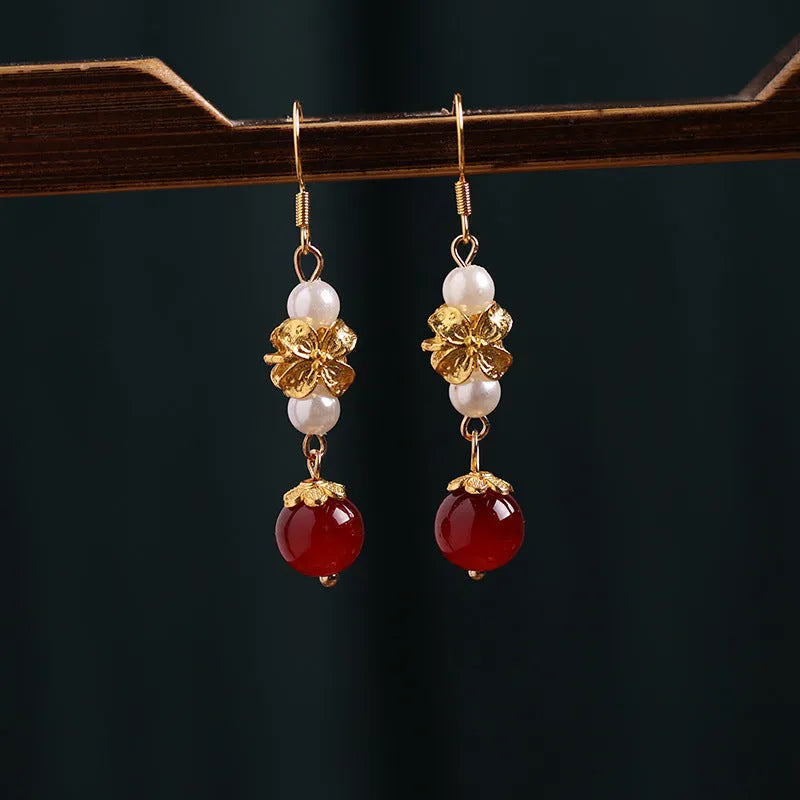 A pair of geometric retro-style alloy earrings with an electroplated finish, designed with vintage court and Han cheongsam inspiration.