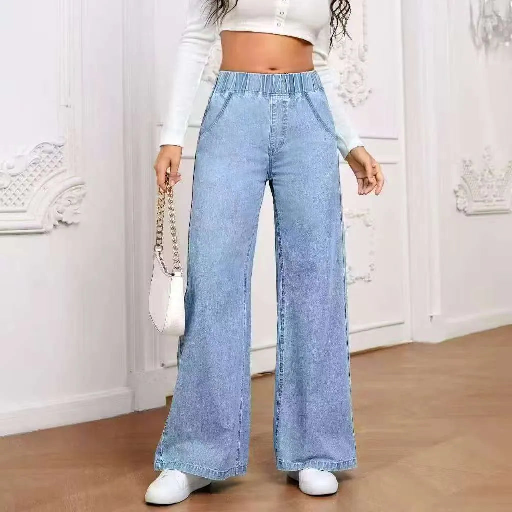 Plus size light blue washed wide-leg straight-leg jeans on a hanger.