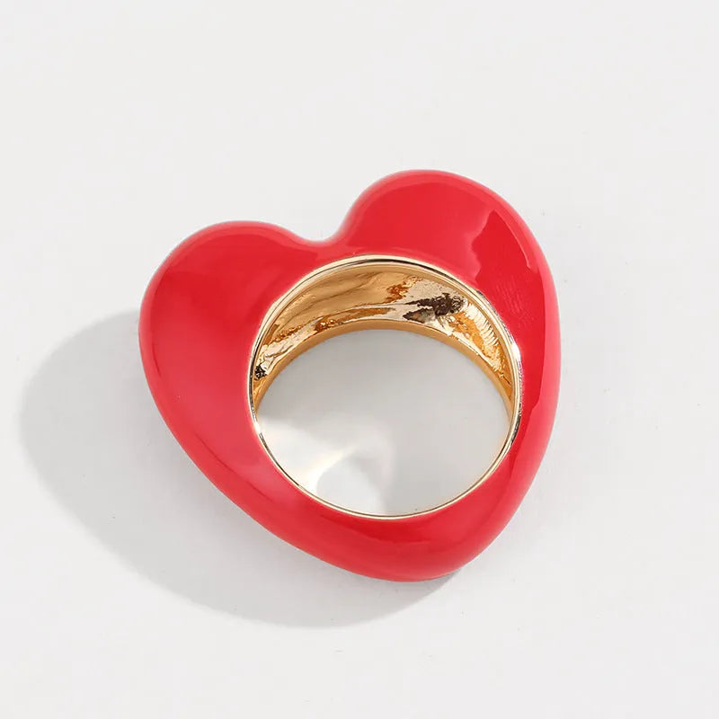 Original design heart-shaped ring with 3D enamel detail in a choice of colours.