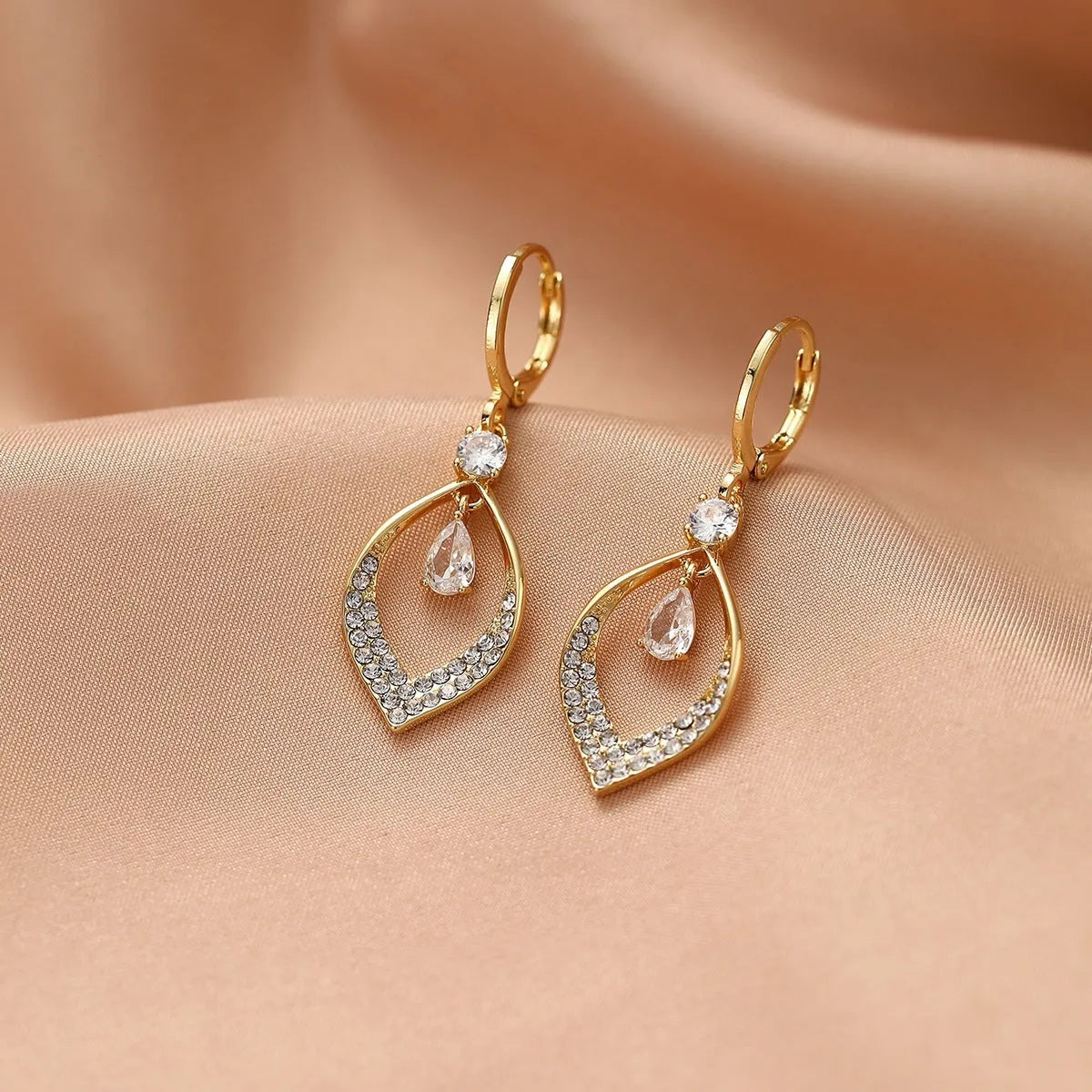 Water drop tassel earrings with zircon detailing in gold or silver electroplated finish