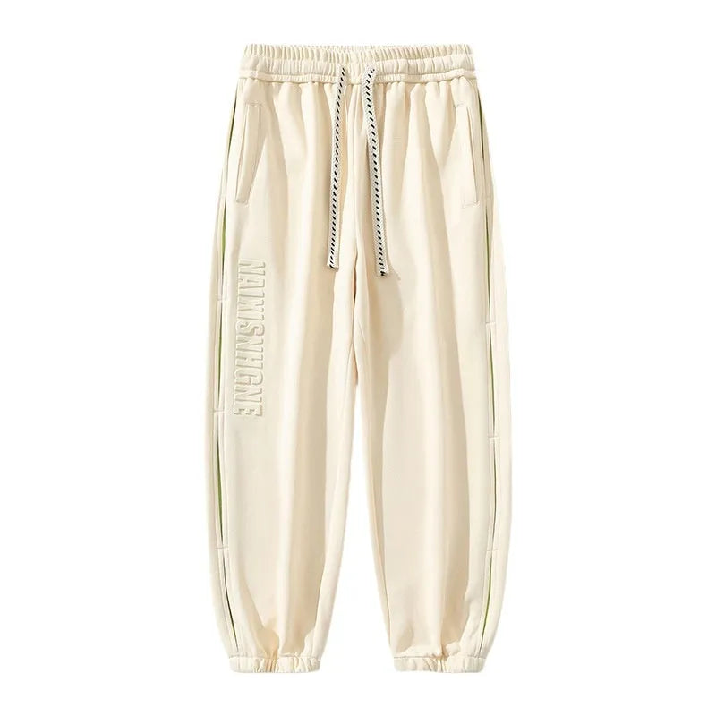 Men's loose cotton trousers with ankle banding and skinny leg design in black colour