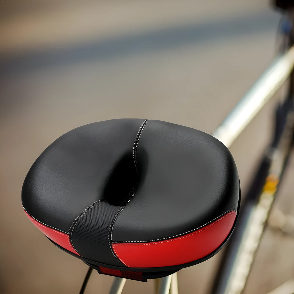 Large thickened bicycle saddle with reflective stitching in red, grey, or light brown colour