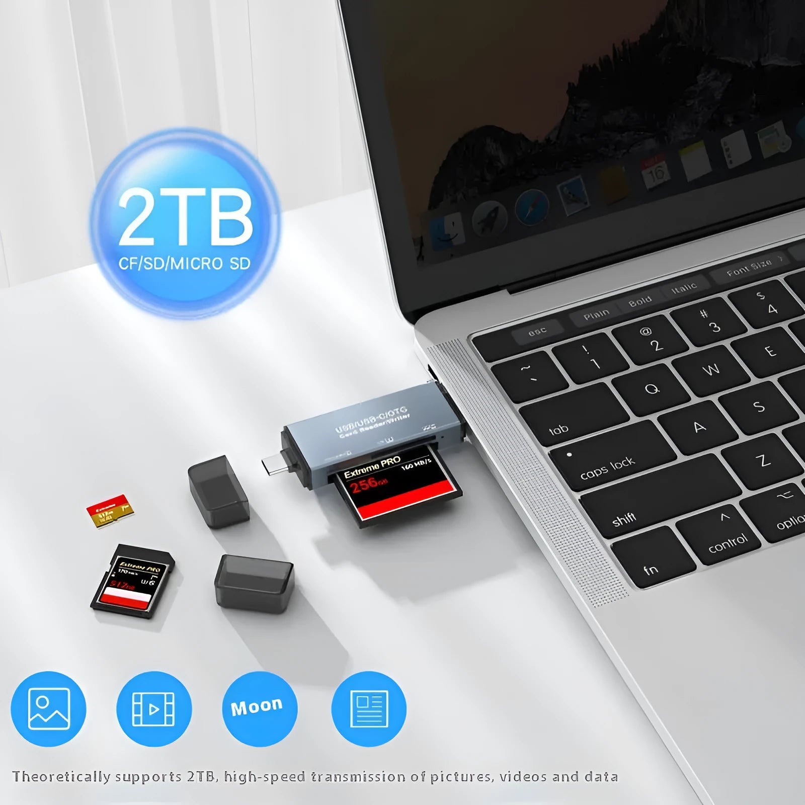 Silver aluminium alloy USB card reader with CF, SD, and TF slots on a desk.