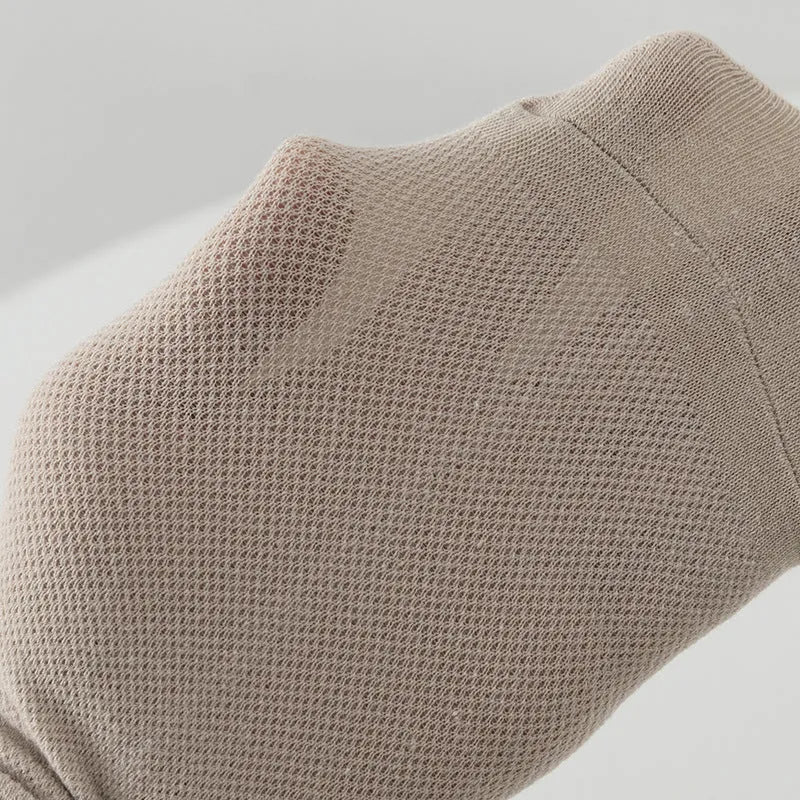 Men's low-cut polyester boat socks in solid colours showing breathable casual design