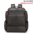 Dark brown retro genuine leather backpack for men, open to show laptop compartment and internal organisers.