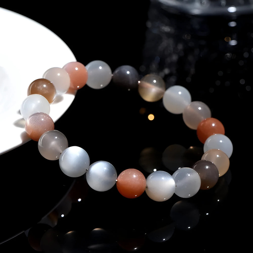 Natural moonstone bracelet with colourful pattern showing 8mm beads in single circle configuration