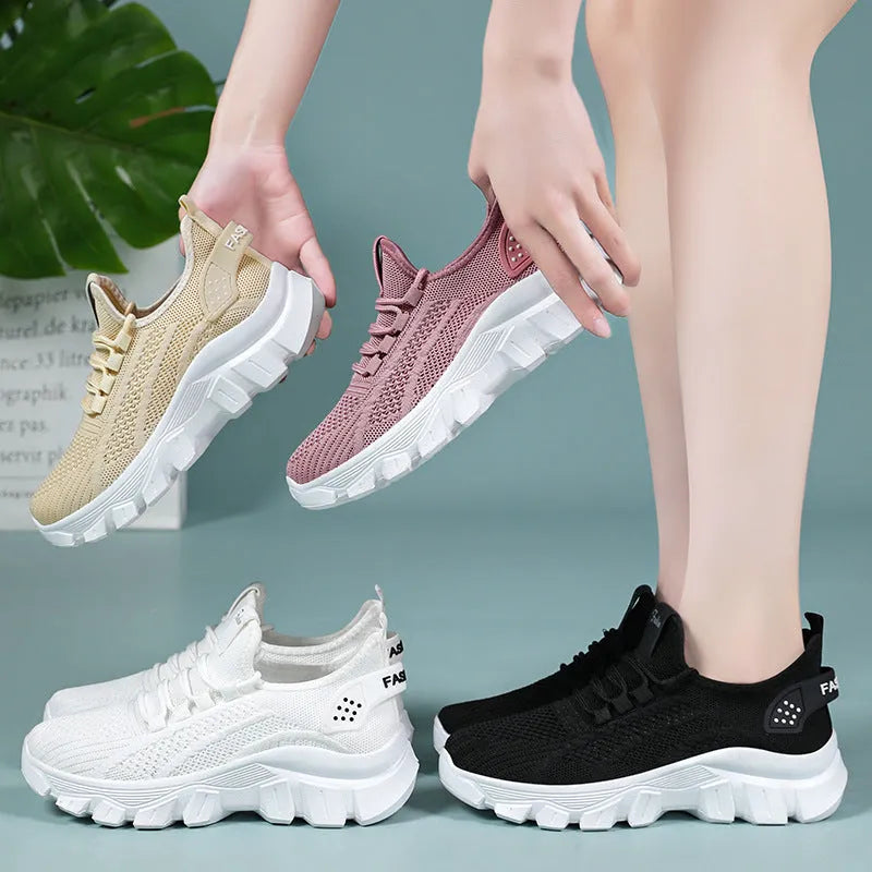 Men's white Flyknit and PVC sole tennis shoes with round toe and flat heel