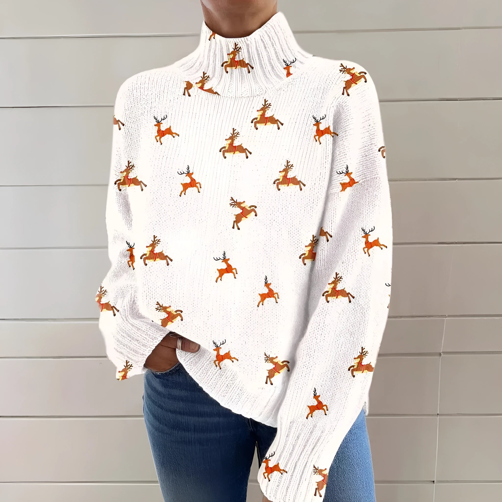 Women's loose-fit Christmas printed turtleneck sweater in a macaron colour on a hanger