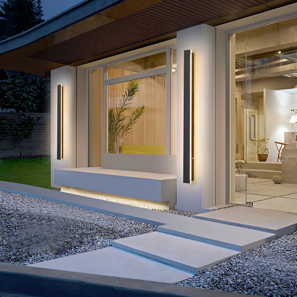 Straight outdoor LED wall lamp with IP65 waterproof rating installed on exterior brick wall