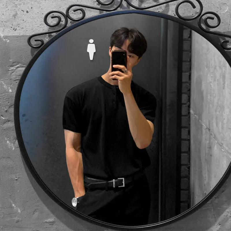 Men's black thin slim-fit ice silk knitted short-sleeved shirt on a hanger.