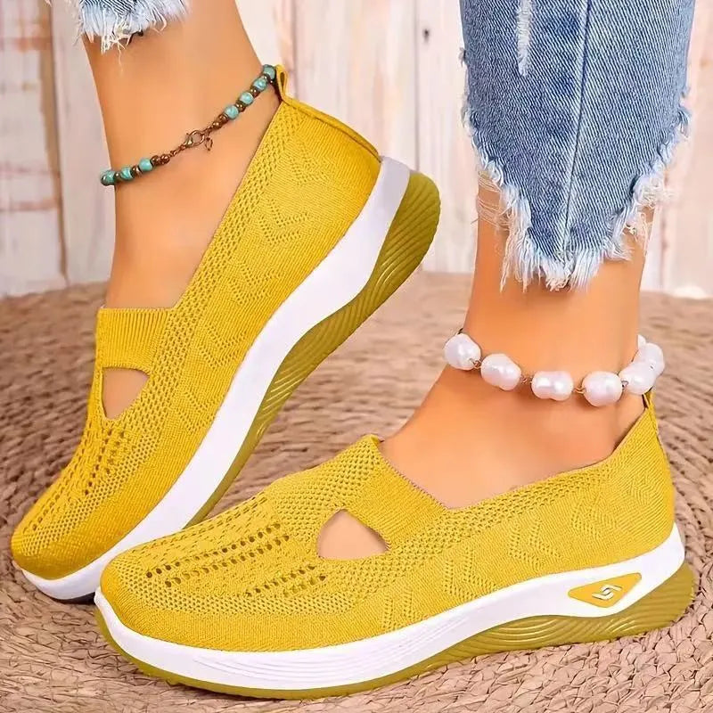 Women's low-top mesh casual shoes with a T-strap, flat heel, and round toe in various colours.