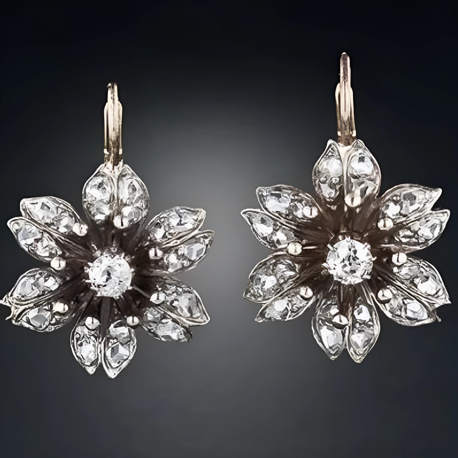 Silver retro fashion women's earrings with creative design in electroplated alloy material