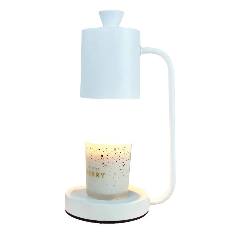 White European-style metal aromatherapy lamp with dimmer switch on wooden table