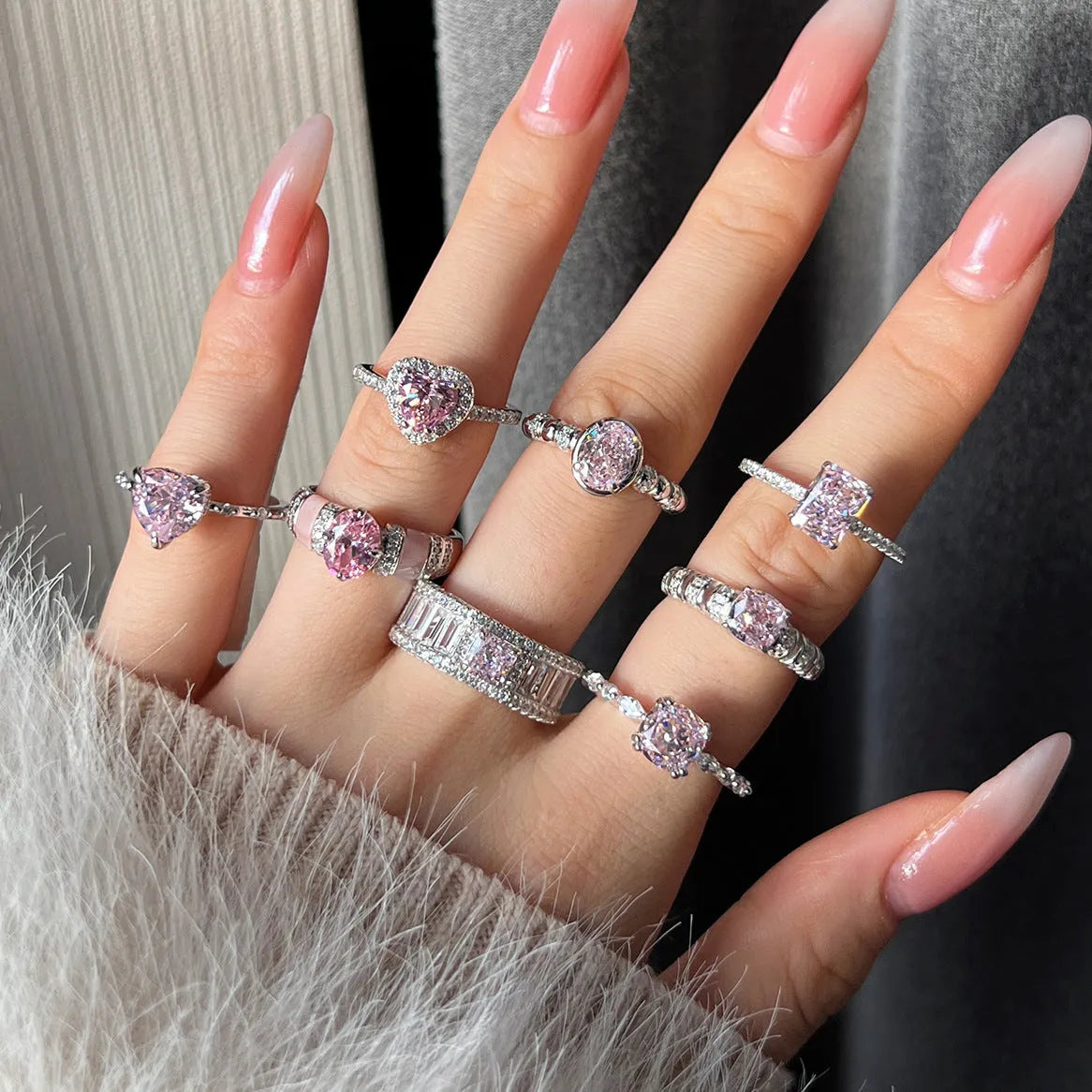 S925 sterling silver ice flower cut zircon inlaid ring with platinum electroplating on white background