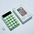 Q3 wireless digital keyboard in a macaron colour option on a desk.