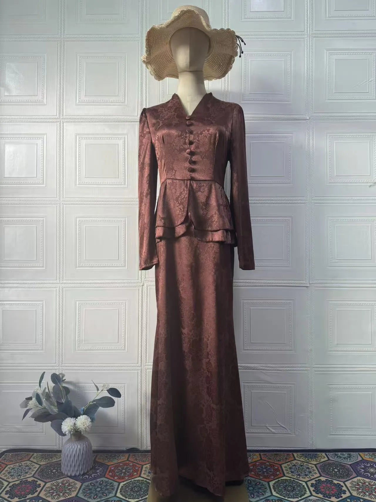 Dark brown retro artistic long dress with floral plant pattern, button detailing, and long sleeves