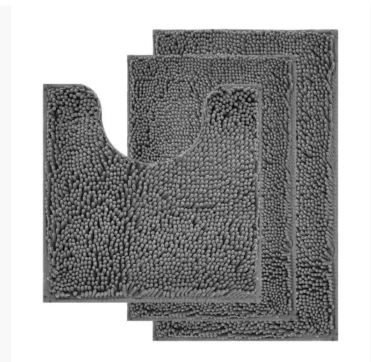 Chenille three-piece bathroom toilet mat set with U-shaped grey mat and rectangular mats on tiled floor.