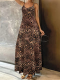 Dark brown leopard print sleeveless sling dress with round neck and shoulder strap, long hip skirt.