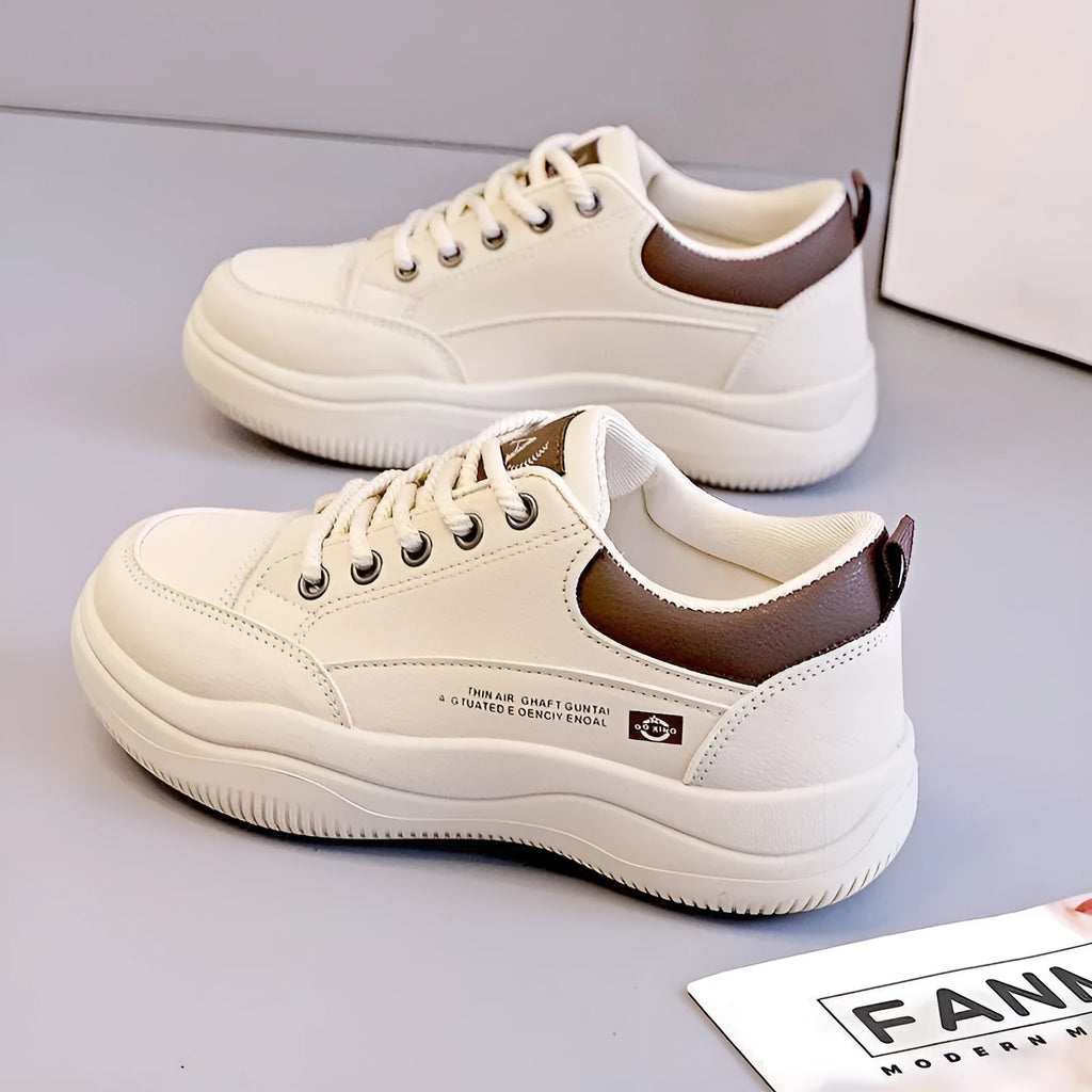 Women's white Korean-style lace-up shoes with cross-strap detailing and flat mid heel