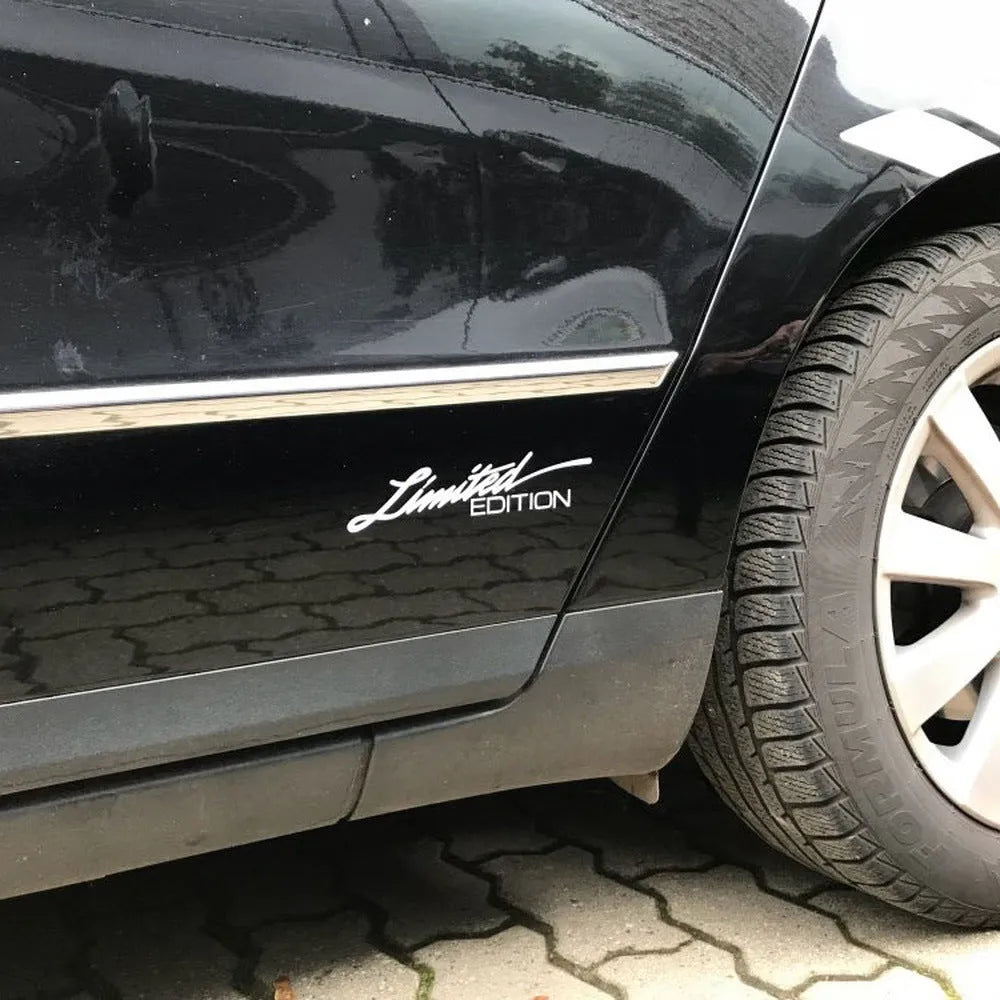 Reflective British style bumper sticker on plastic sheet, showing black, white, and colourful design options.