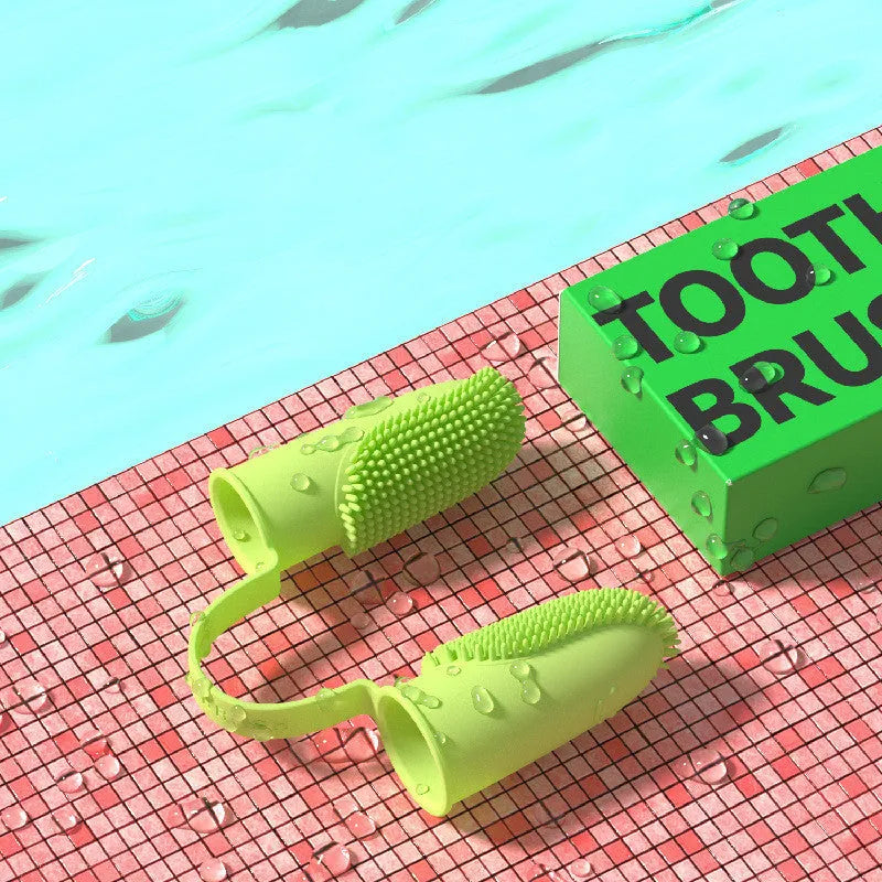 TPR pet dental cleaning finger set in pink, blue green, and yellow for dog and cat teeth.